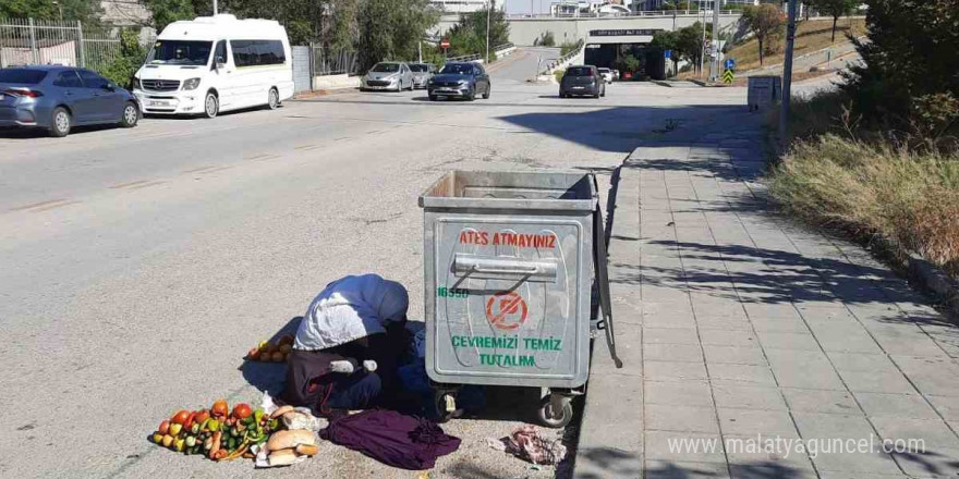 Çöpten yemek toplama numarasıyla dilencilik yapan kadın yakalandı