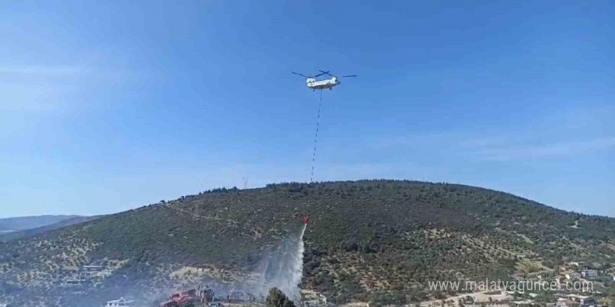 Foça’da bir depoda başlayan ve ormanlık alana sıçrayan yangın söndürüldü