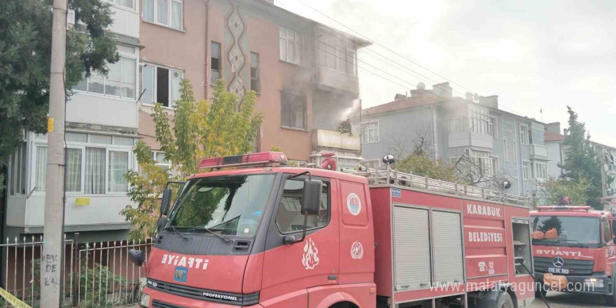 Yangında mahsur kalanları komşuları kurtardı